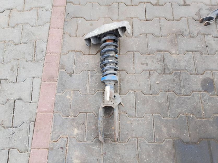 PORSCHE CAYENNE 7L AMORTYZATOR LEWY PRZÓD PRZEDNI 7L5412021