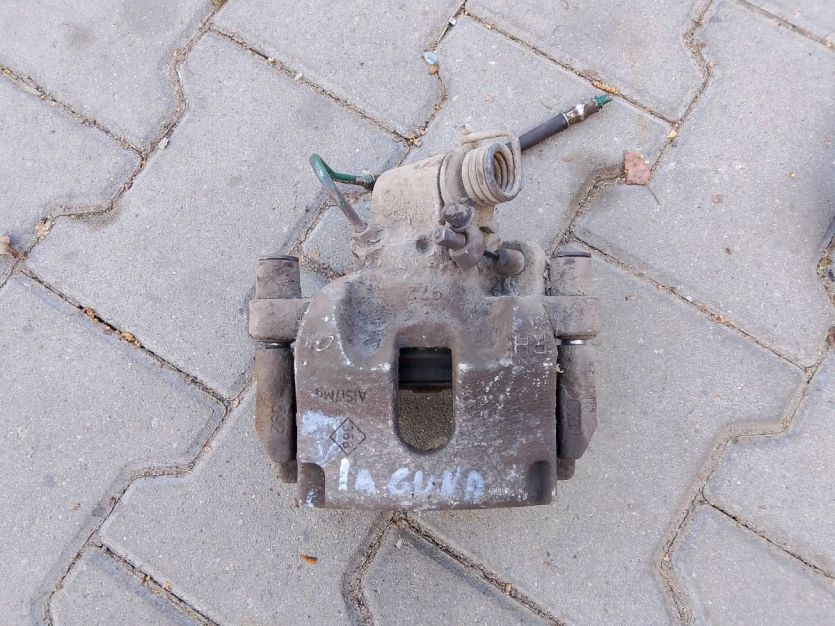 RENAULT LAGUNA III 3 ZACISK HAMULCA PRAWY TYŁ TYLNY
