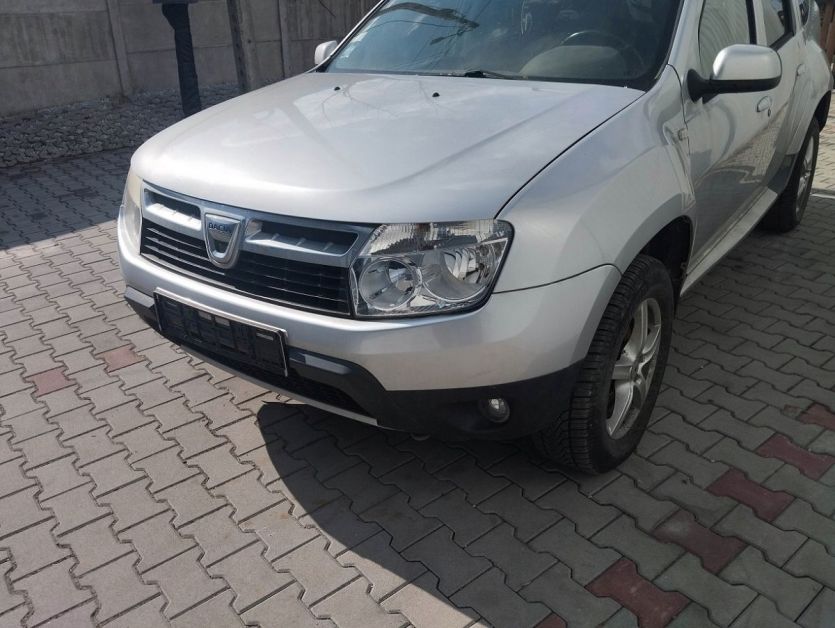 DACIA DUSTER I 2011 PRZOD MASKA ZDERZAK BLOTNIK LAMPA PAS PRZEDNIA TED69
