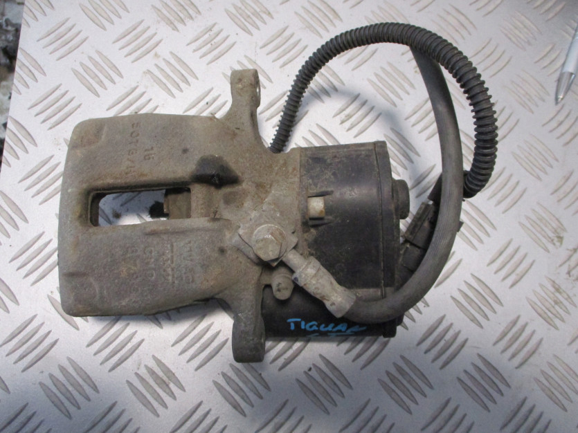 VW TIGUAN ZACISK HAMULCOWY LEWY TYŁ