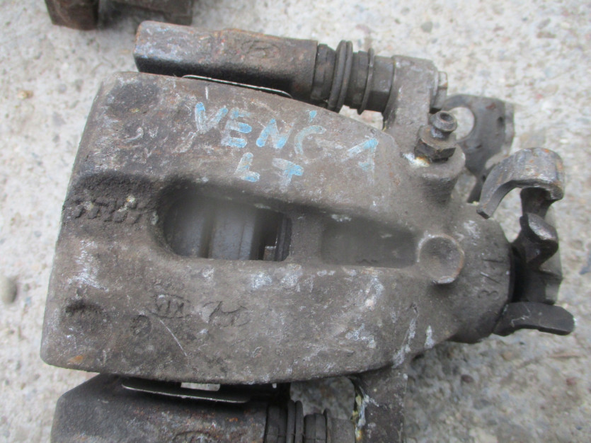 KIA VENGA ZACISK HAMULCOWY LEWY TYŁ