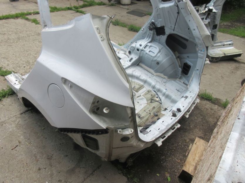 HYUNDAI IX35 LIFT BŁOTNIK PAS TYŁ WANNA TCW