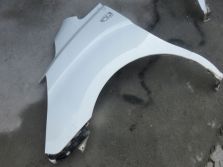 HYUNDAI H-1 II 2010 R. BŁOTNIK LEWY PRZÓD