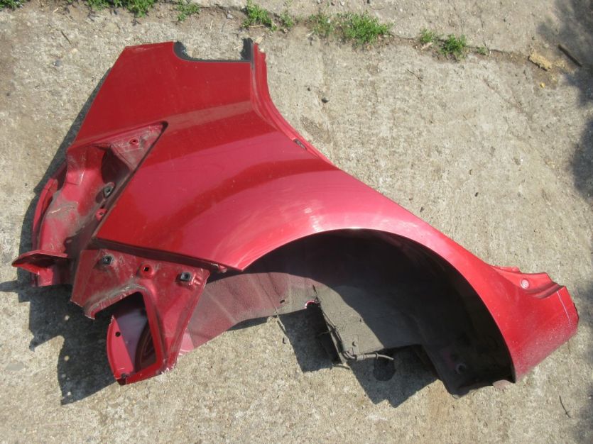 KIA VENGA BŁOTNIK PRAWY TYŁ A0