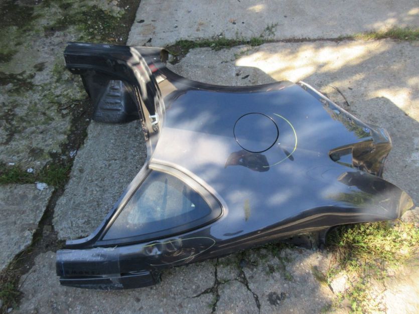 ASTRA J LIFT SEDAN BŁOTNIK PRAWY TYŁ