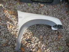 DACIA DUSTER I LIFT 2015 R. BŁOTNIK PRAWY PRZÓD