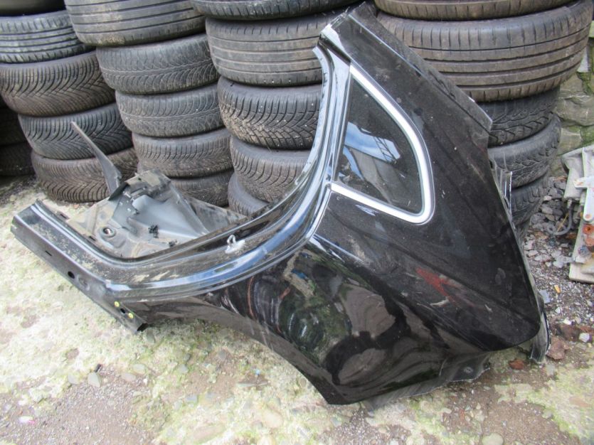 VOLVO V40 II lift R DESING T4 BŁOTNIK LEWY TYŁ