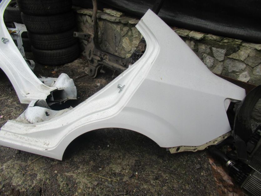 CHEVROLET AVEO T300 SEDAN błotnik lewy tył WYSYŁKA