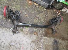 CHEVROLET AVEO T300 SEDAN OŚ BELKA TYŁ WYSYŁKA