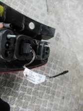 DACIA DUSTER I 2011 R. LAMPA LEWY TYŁ 265550035R