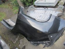 DACIA LODGY BŁOTNIK LEWY TYŁ