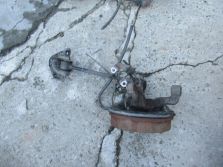 DACIA DUSTER I LIFT 1.6 4X4 ZAWIESZENIE TYŁ LEWY TYŁ PIASTA LEWA WYSYŁKA