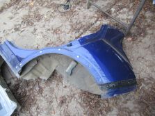 NISSAN JUKE I LIFT 2015 R. BŁOTNIK LEWY TYŁ