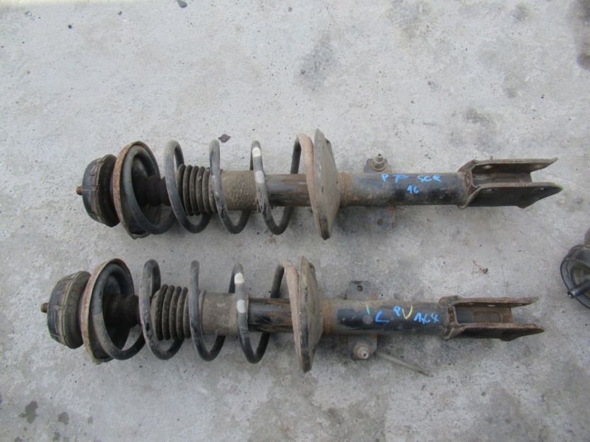 DACIA DUSTER I LIFT 1.6 SCE 4X4 AMORTYZATOR LEWY PRZÓD