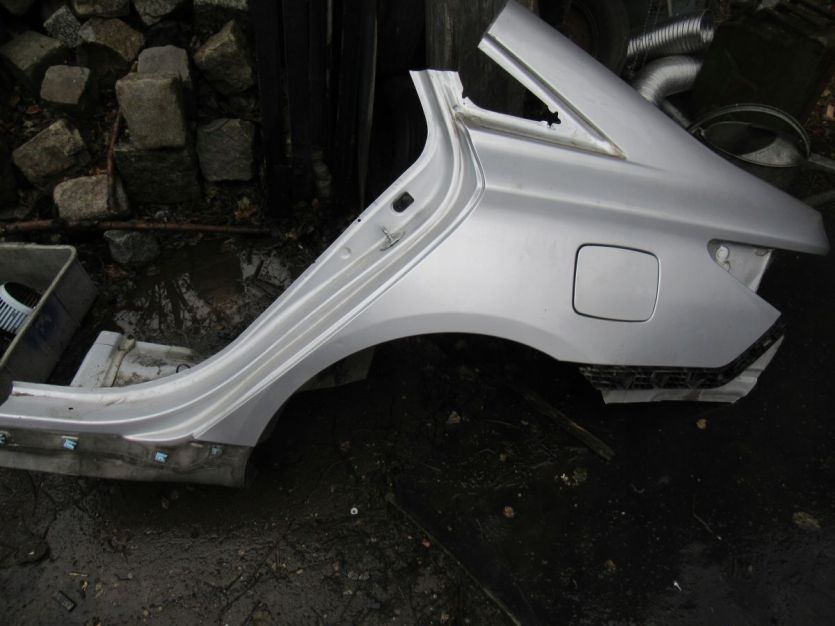 HYUNDAI SONATA SEDAN HYBRID 2010-2015 BŁOTNIK LEWY TYŁ