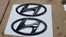 Znaczek Emblemat Logo PRZÓD Grill Hyundai Tucson IV Ciemny CHROM 86300N9010