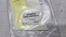 Emblemat Znaczek Napis modelu Kia RIO III IV 2011- OE 86310-1W000 NOWY ASO!
